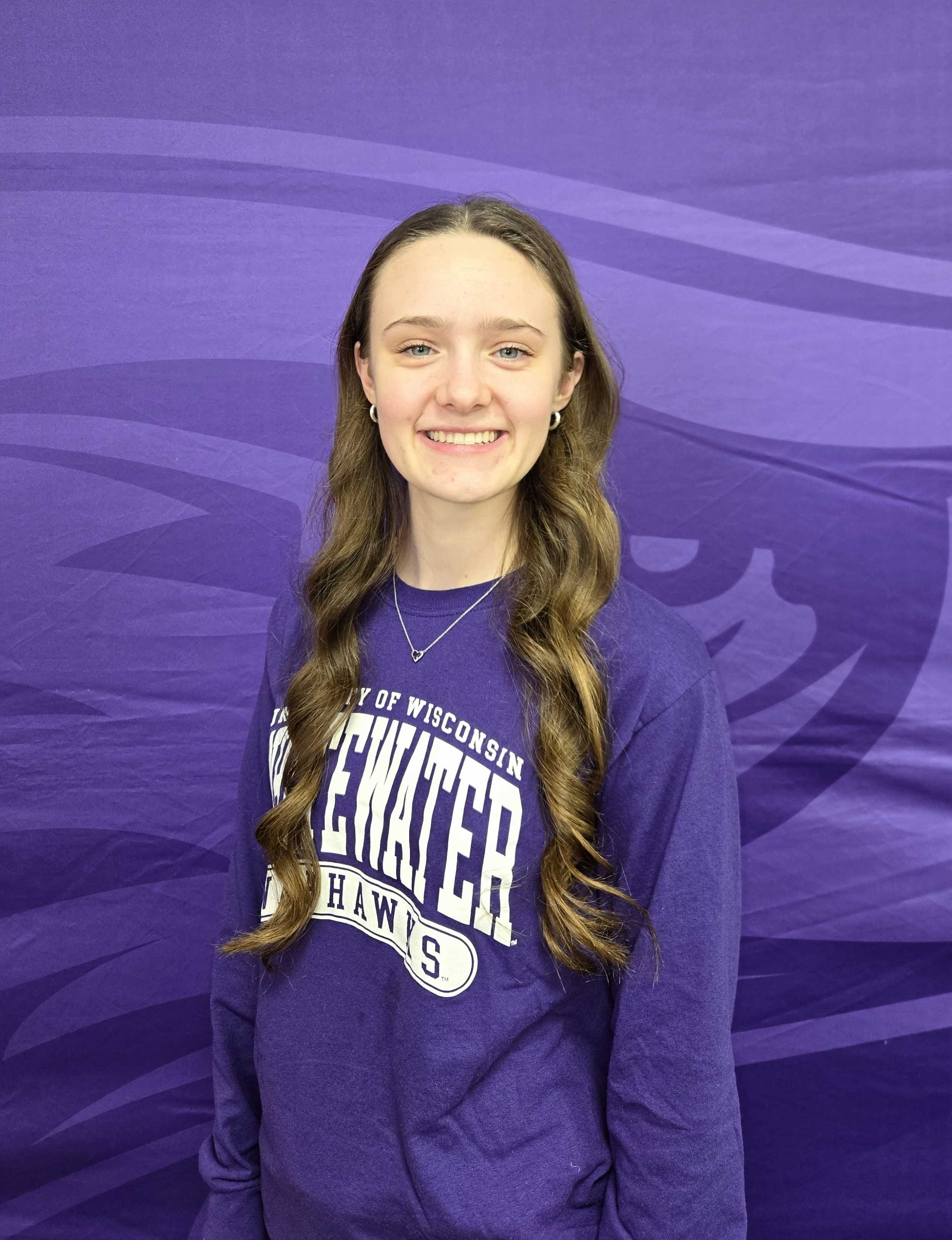 A headshot of Hannah